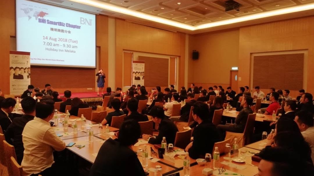 A packed BNI chapter meeting in Melaka — a room full of business owners